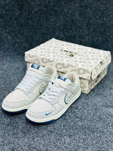 *Nike SB Dunk Low "The North Face x CDG"*
